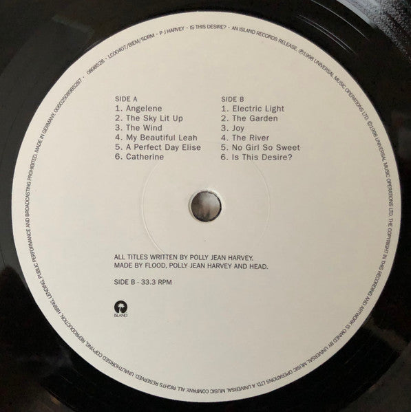 P J Harvey* : Is This Desire? (LP, Album, RE, 180)